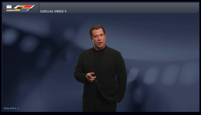 Chili Palmer, played by John Travolta, stands within the Cadillac Under 5 introduction screen.